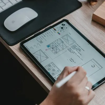 Designing a website wireframe on a tablet
