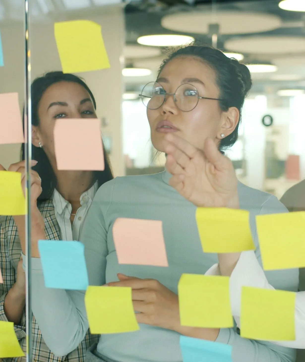 Team brainstorming with sticky notes